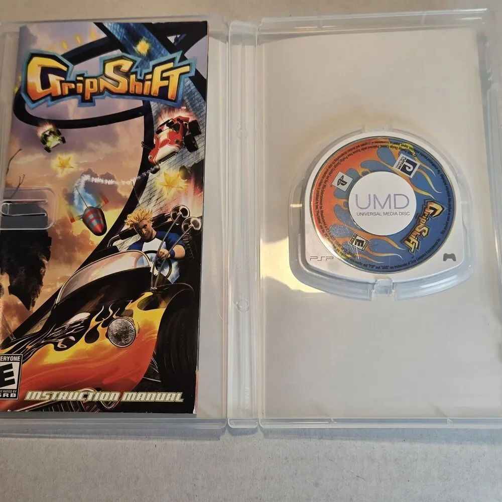 GripShift (Sony PSP) - Complete with Case - Tested & Working Missing Manual